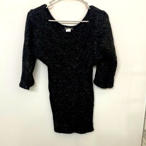 Black rib fitted sweater. With 3/4 bell sleeves. Shimmery stitching